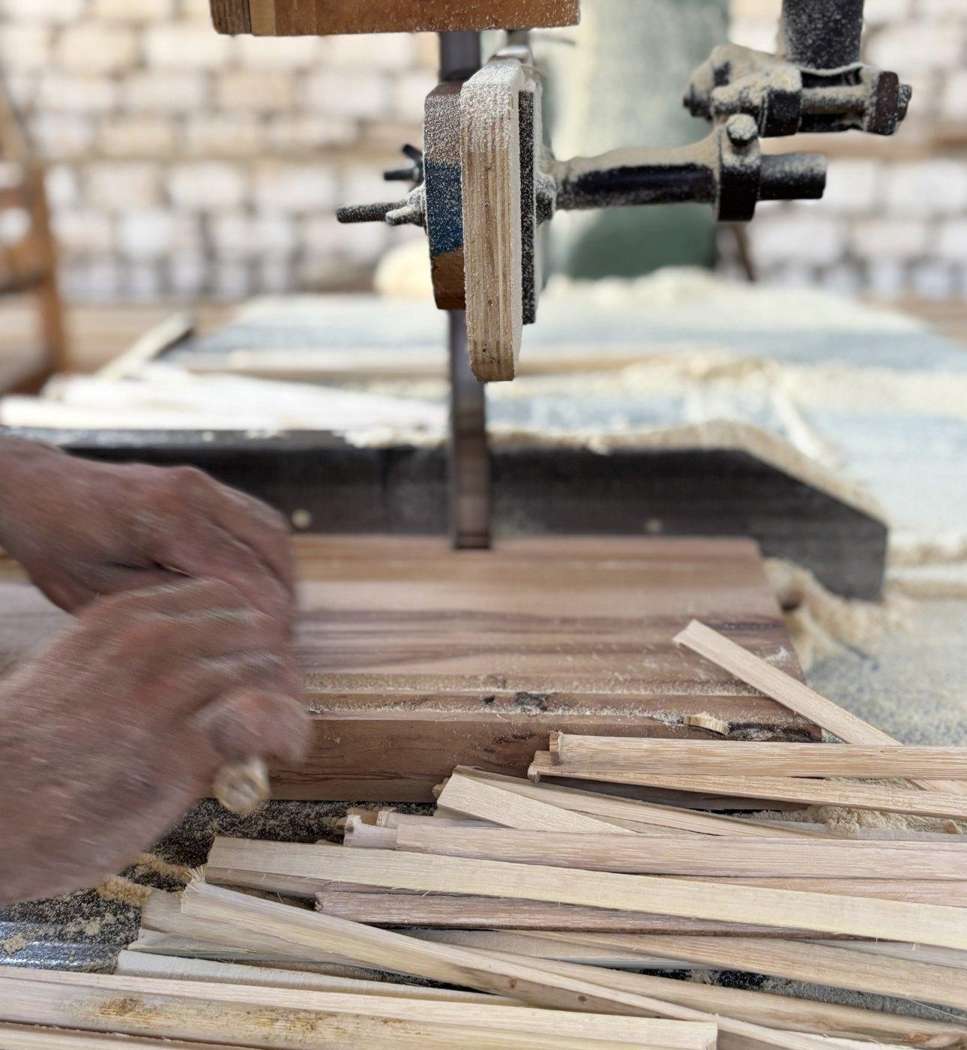 Cutting palm rib in the workshop